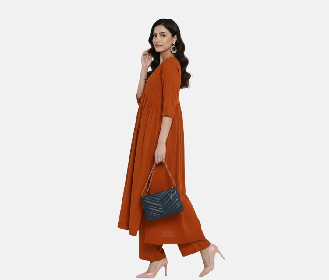 Paris Tip  Rest Orange Stylish Cambric Cotton V-Neck Kurta Set With Silver Stitch Lines Paired With Comfortable Pants