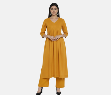 Milano Mustrad Yellow Stylish Cambric Cotton V-Neck Kurta Set With Silver Stitch Lines Paired With Comfortable Pants