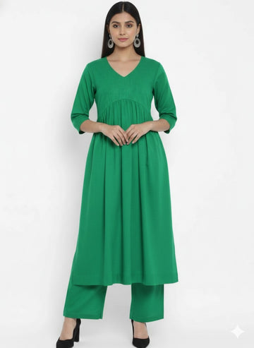 Naughty Green Stylish Cambric Cotton V-Neck Kurta Set With Silver Stitch Lines Paired With Comfortable Pants