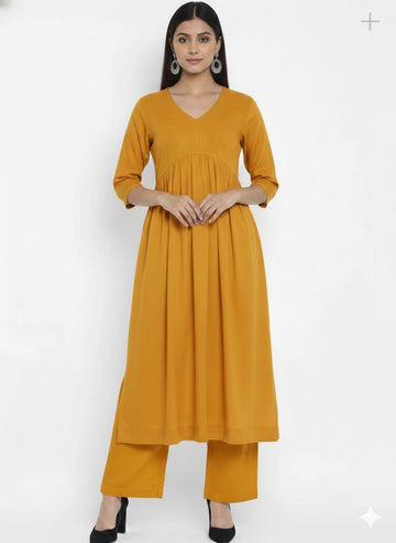 Milano Mustrad Yellow Stylish Cambric Cotton V-Neck Kurta Set With Silver Stitch Lines Paired With Comfortable Pants