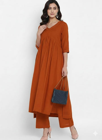 Paris Tip  Rest Orange Stylish Cambric Cotton V-Neck Kurta Set With Silver Stitch Lines Paired With Comfortable Pants