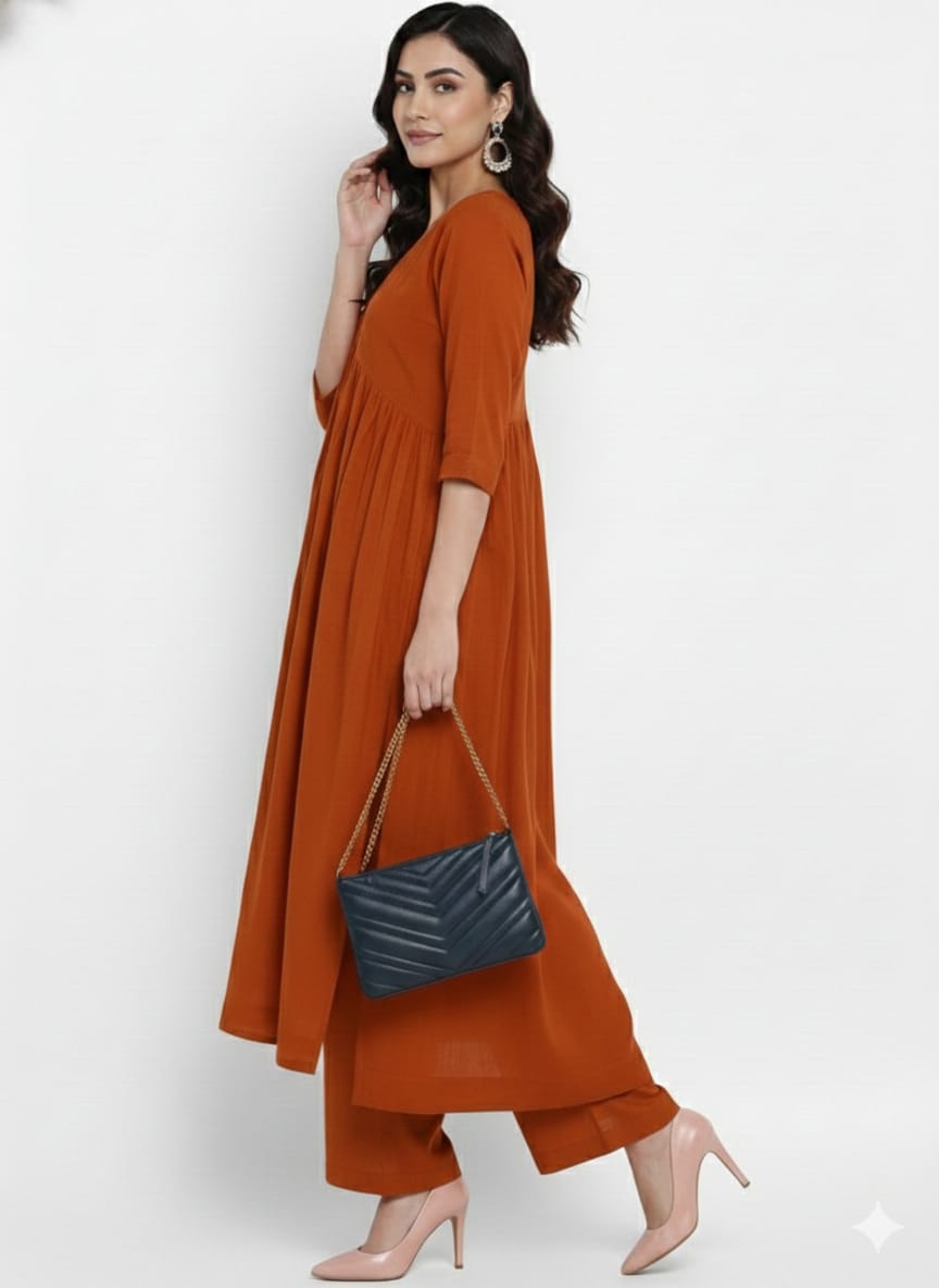 Paris Tip  Rest Orange Stylish Cambric Cotton V-Neck Kurta Set With Silver Stitch Lines Paired With Comfortable Pants