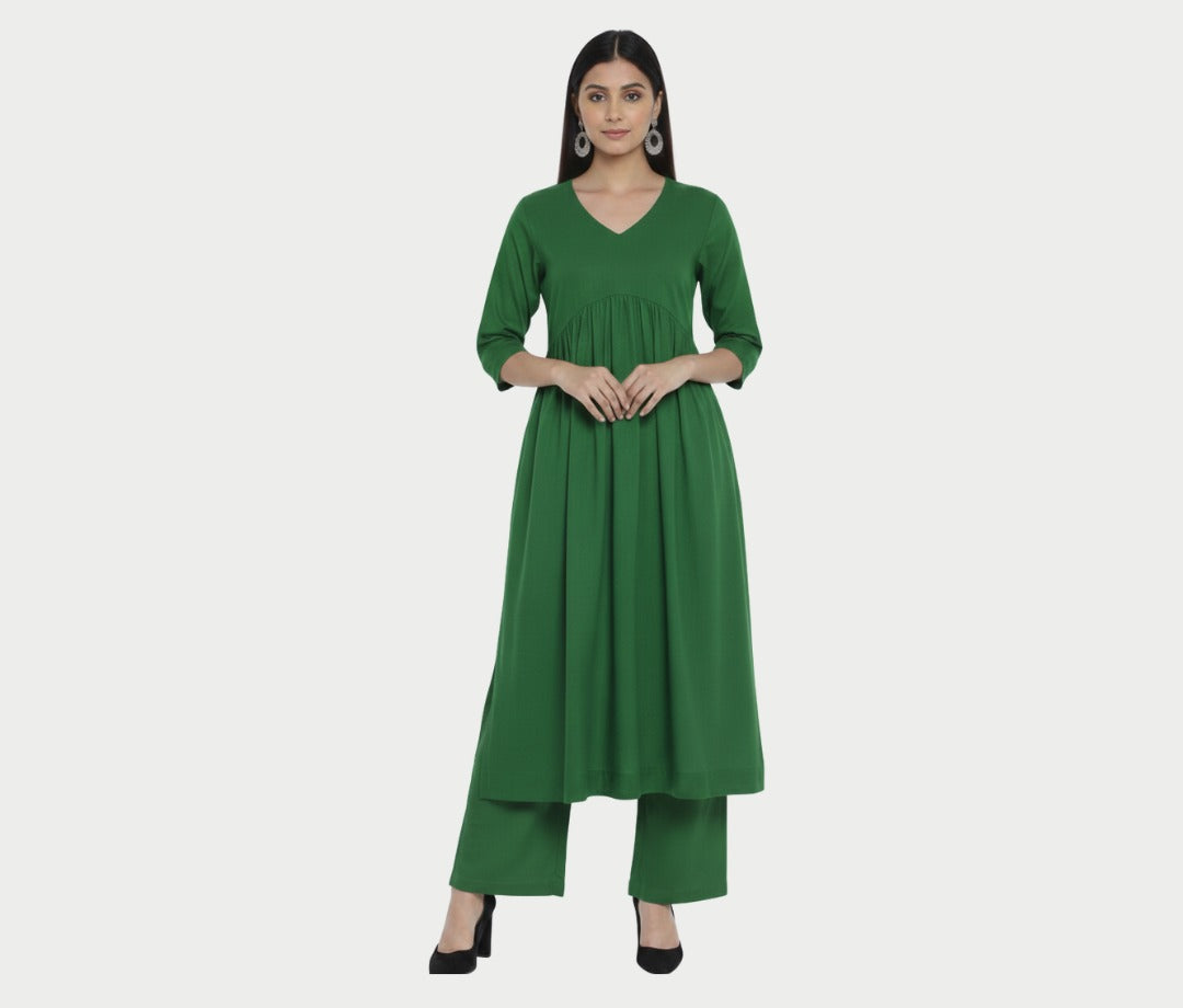 Beautifulll Darkish Green Stylish Cambric Cotton V-Neck Kurta Set With Silver Stitch Lines Paired With Comfortable Pants