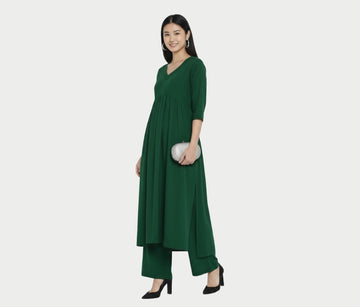 Beautifulll Darkish Green Stylish Cambric Cotton V-Neck Kurta Set With Silver Stitch Lines Paired With Comfortable Pants